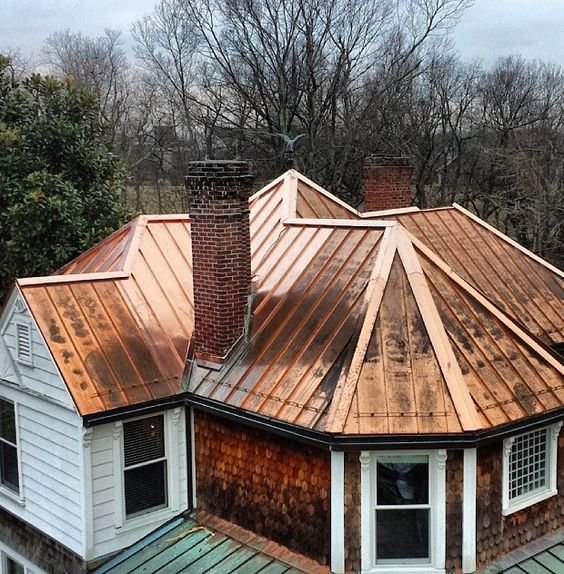 Copper roofing pros and cons on a standing seam copper roof